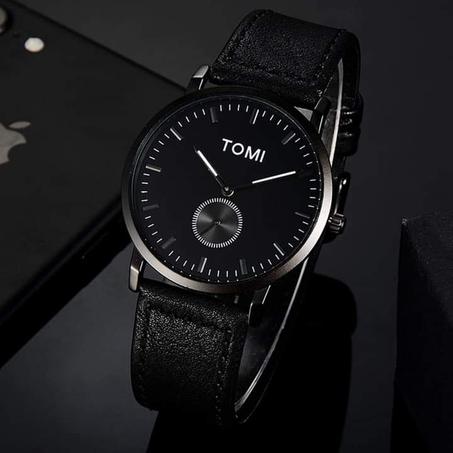 ساعة TOMI