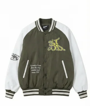 Varsity jacket with contrasting patches and embroidery, side pockets, ribbed trims and snap-button fastening.