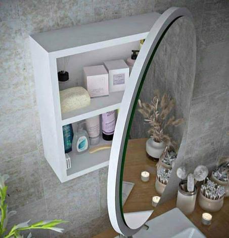 مراة دائرية مضيئة مع رف خلفي