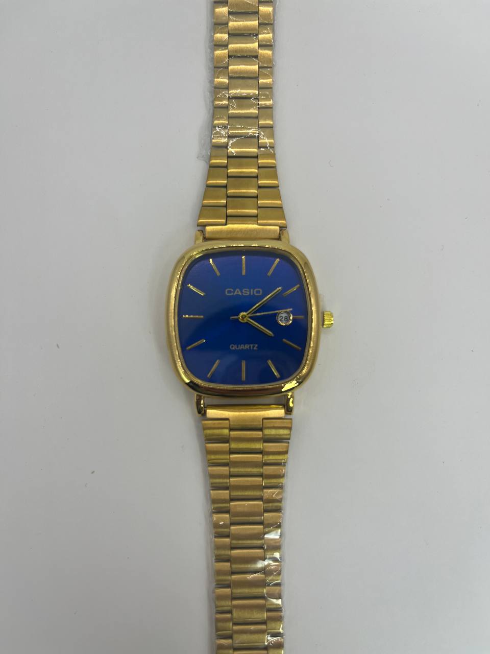 CASIO QUARTZ gold tableau bleu