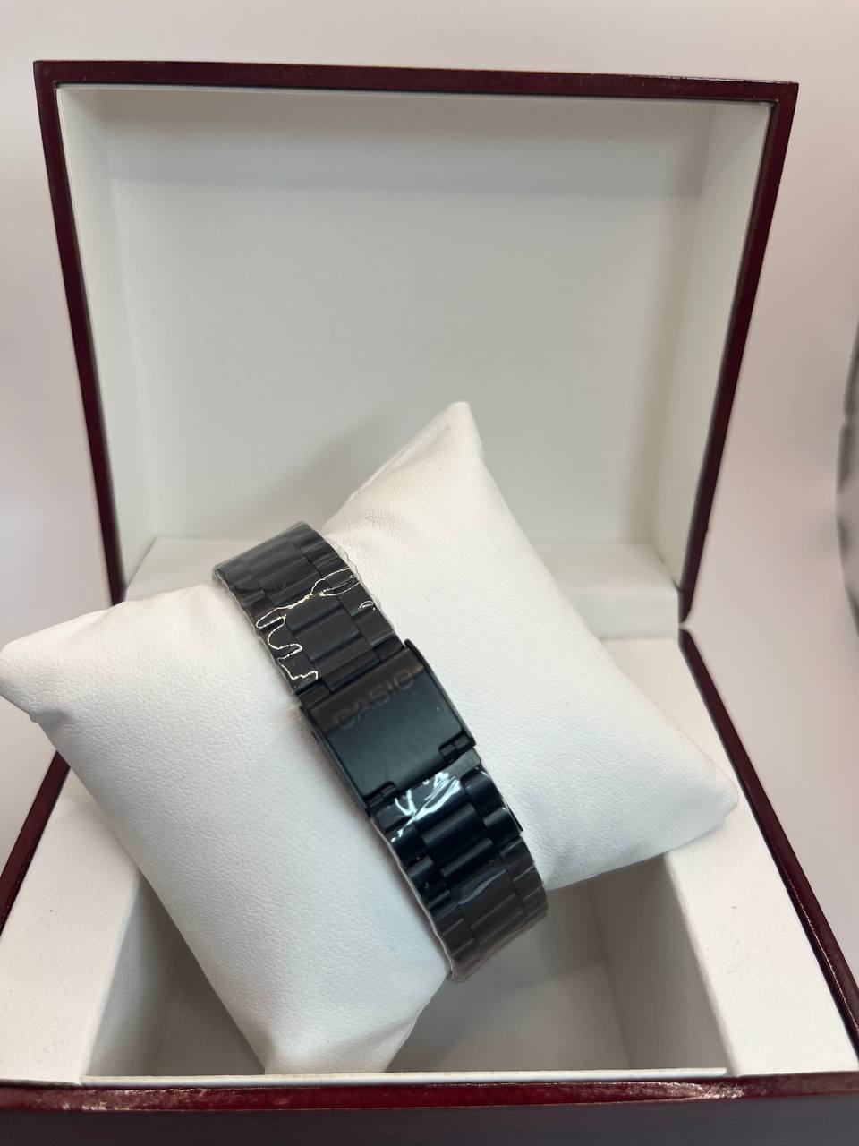 CASIO QUARTZ noir tableau bleu