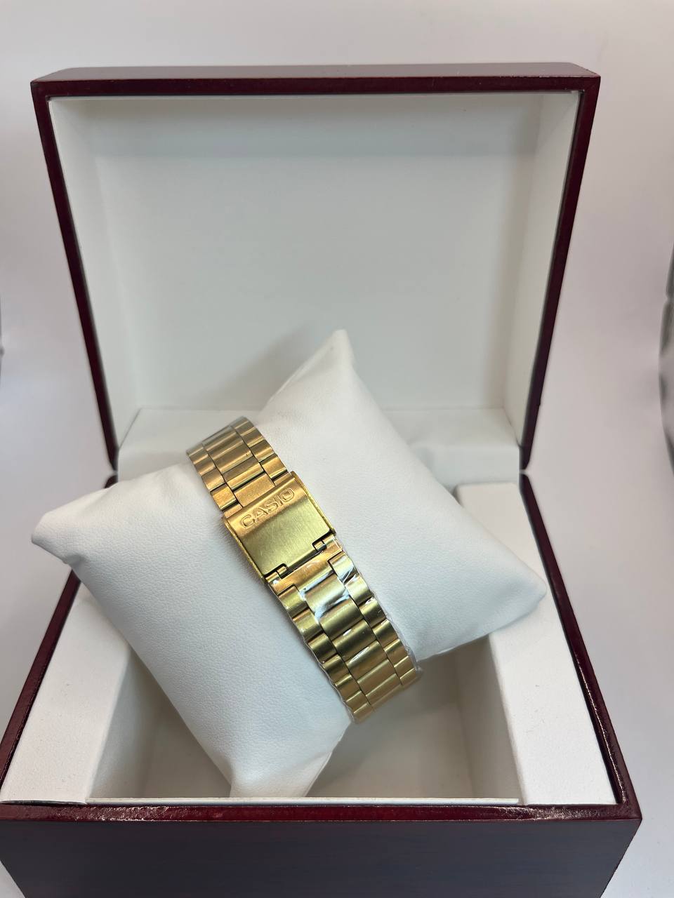 CASIO QUARTZ gold tableau gris