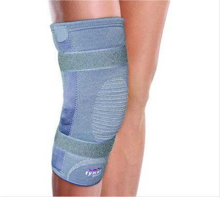 Genouillère avec charnière rigide