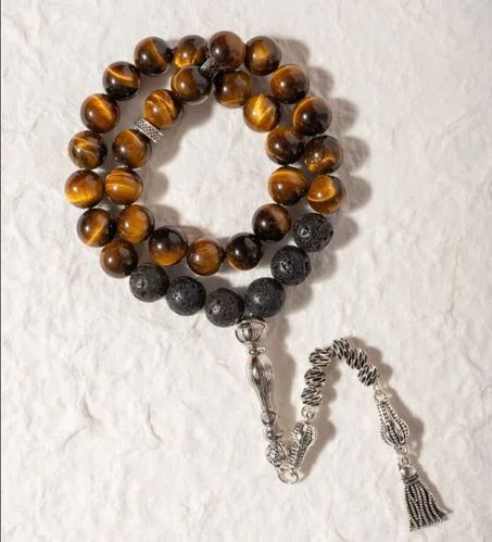 سبحة حجر لافا وعين النمرعسلي