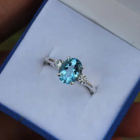 خاتم من التوباز الأزرق السويسري: خاتم خطوبة من الفضة الإسترليني