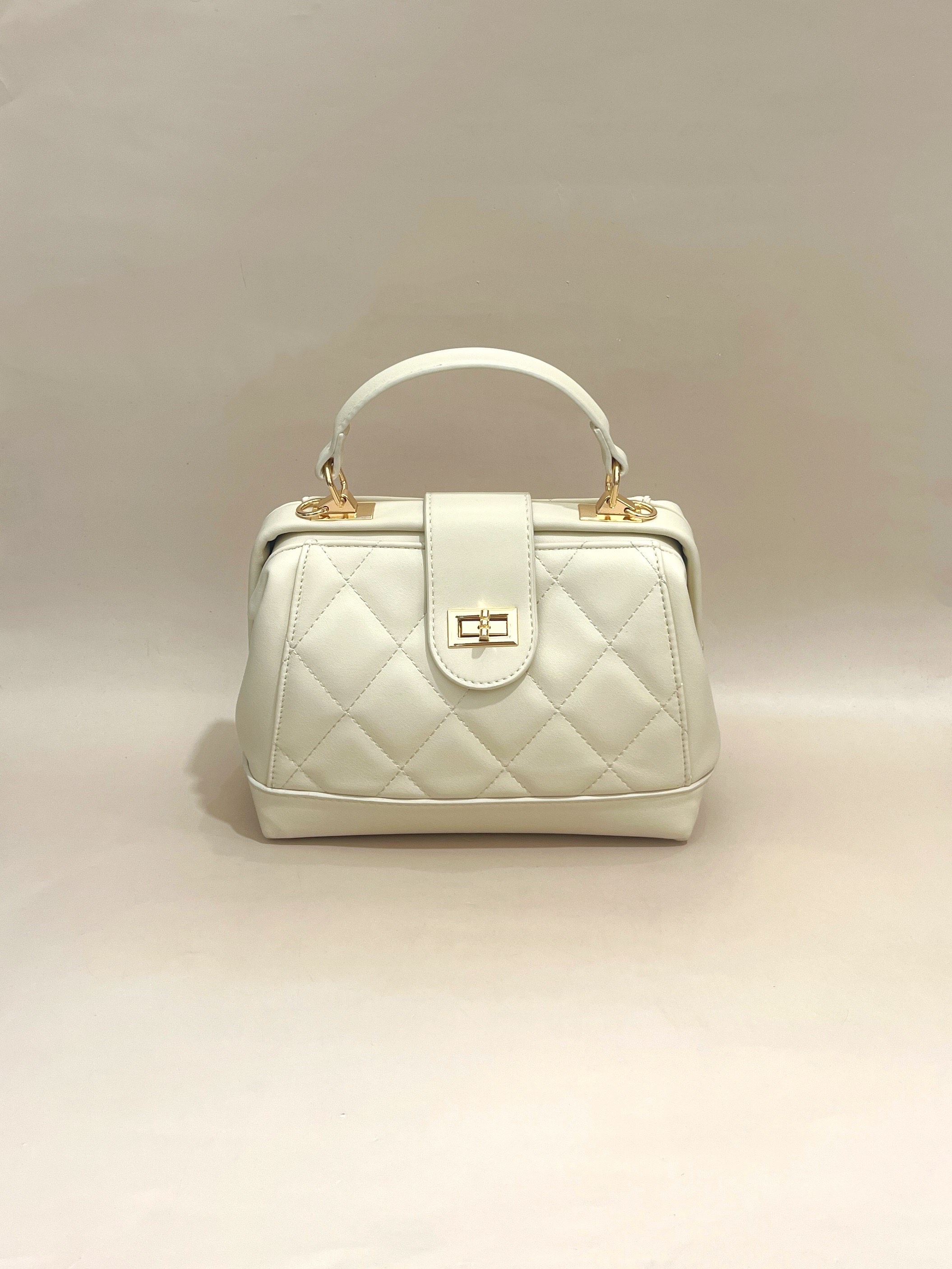 Elegant Quilted Beige Handbag