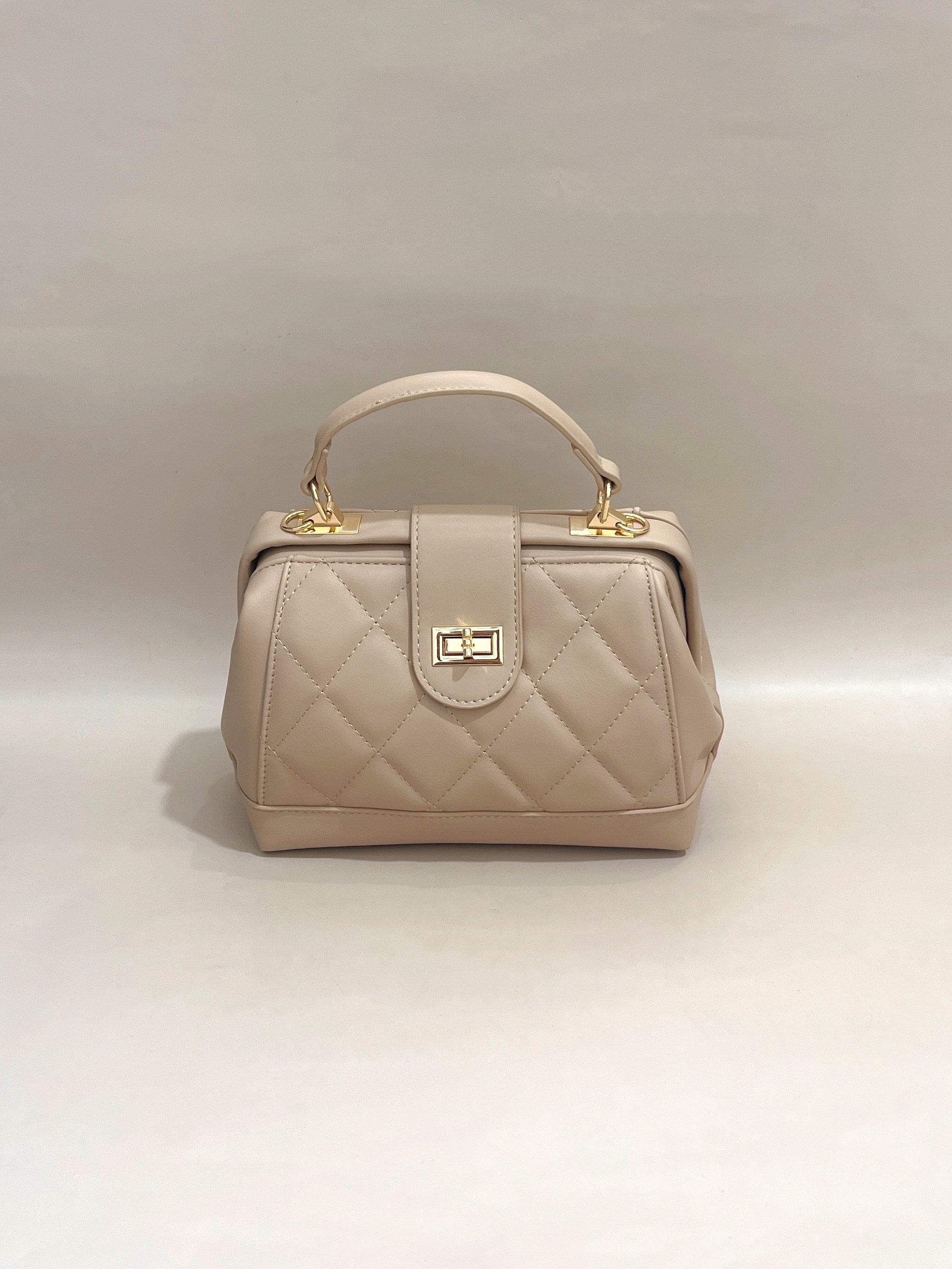 Elegant Quilted Beige Handbag