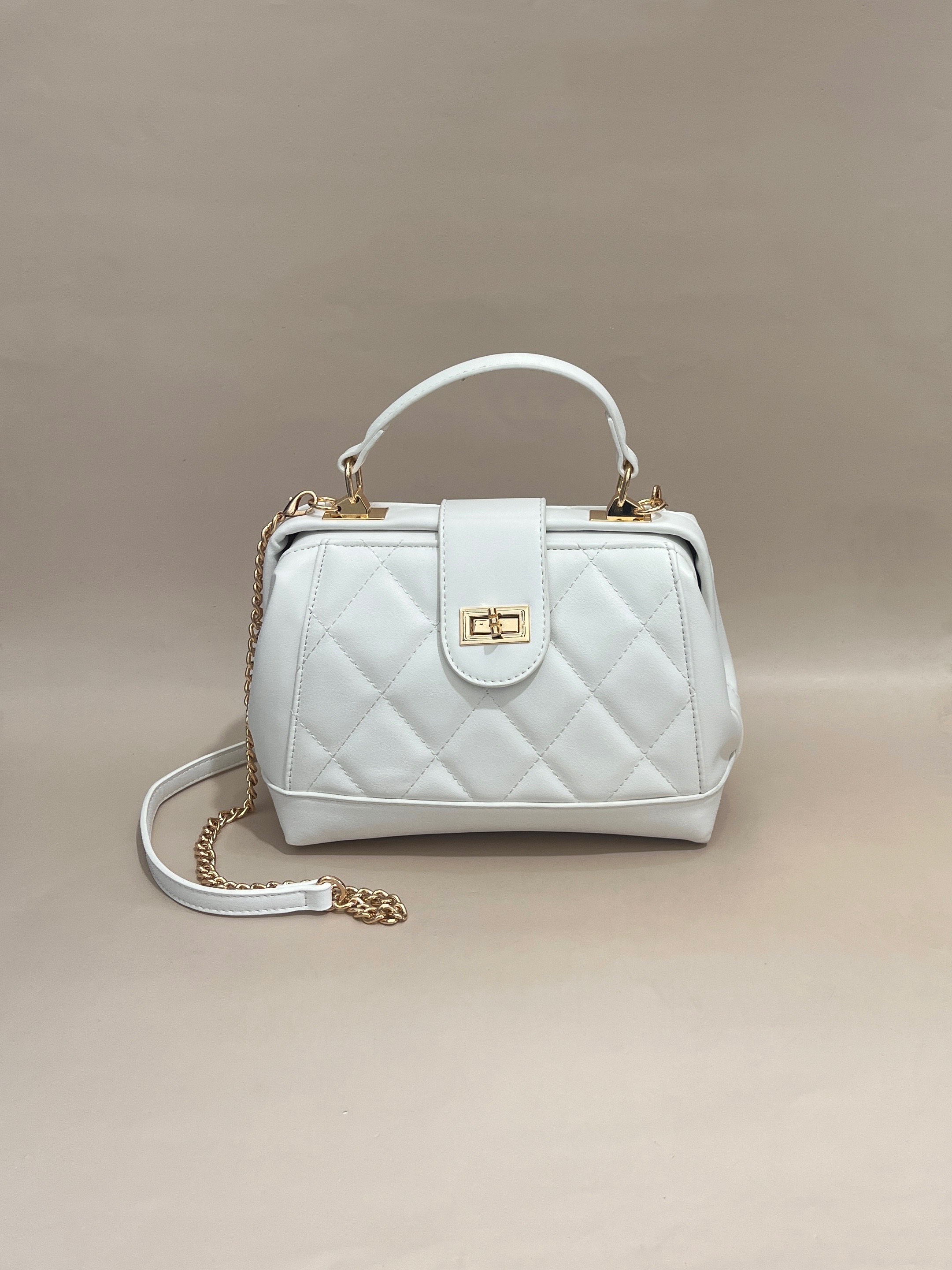 Elegant Quilted Beige Handbag