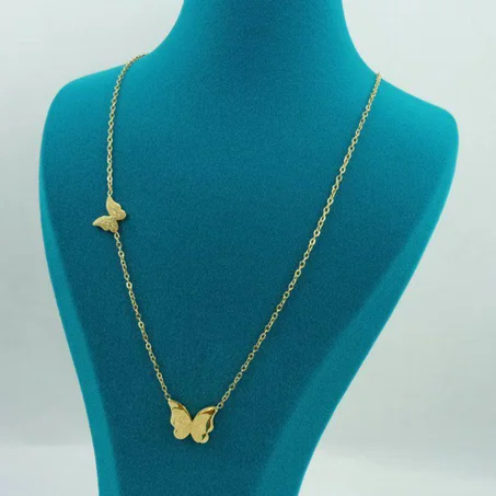 Collier papillon trempés en or, grand et petit papillon.