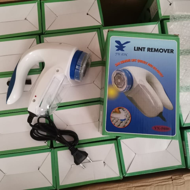 *جهاز إزالة الوبر الكهربائي للملابس