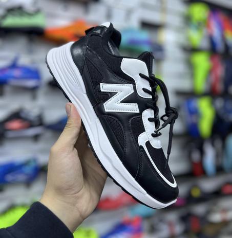 New Balance M63