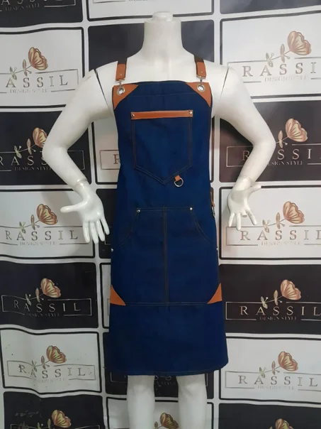 مريلة أنيقة  تأتي بتصميم عصري و أنيق- مصنوعة من قماش الدنيم (الجينز) الخفيف- مريلة اللمطاعم ، الحلاق، النادل، الجزار  غيرها