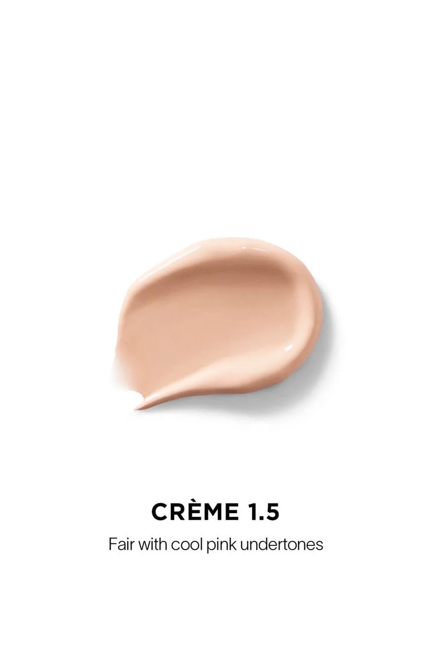 The Hourglass Vanish Airbrush Concealer features a distinctive metallic bronze cap with a slanted geometric design and a soft doe-foot applicator