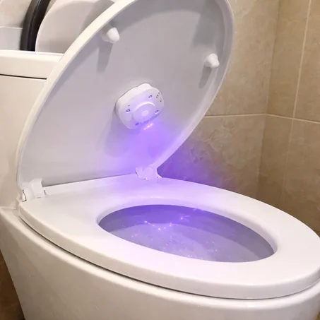 معقم مرحاض ذكي بالأشعة فوق البنفسجية لتعقيم مقعد المرحاض تلقائيًا داخل الحمام