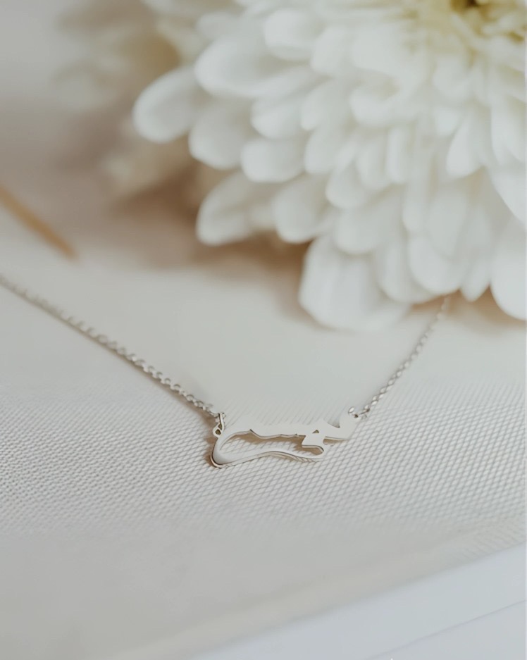 اسمك بقلبيي