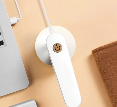 مزيل الوبر الكهربائي باللون الأبيض