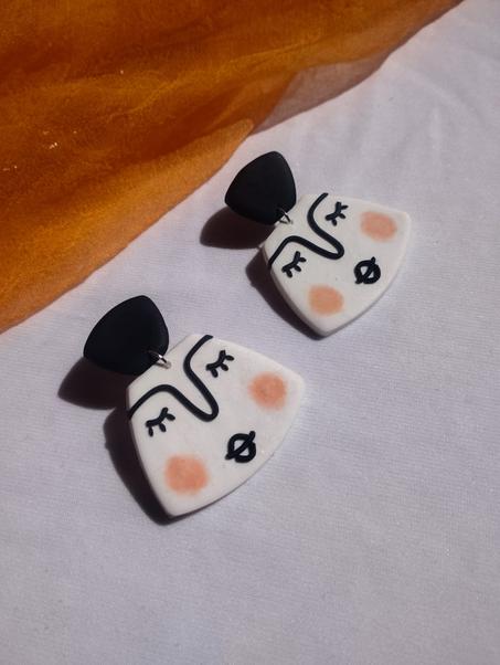 Blush face earrings