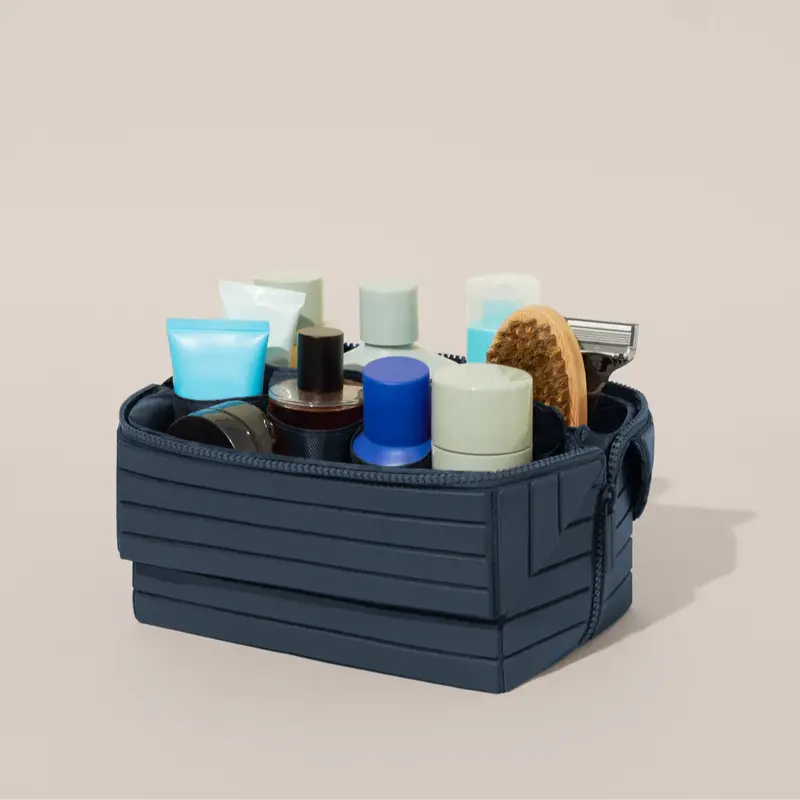 حقيبة جلدية مخططة فاخرة بيد علوية