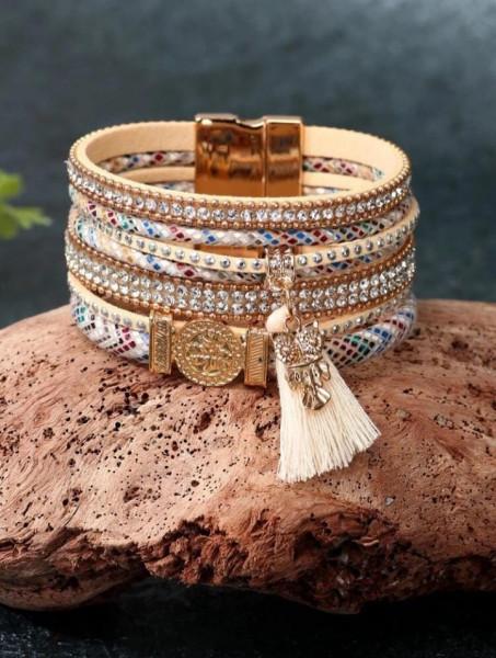 سوار بومة بتعليقة شرابة بديكور حجر الراين