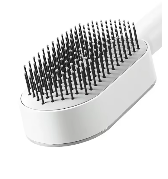 Brosse à cheveux autonettoyante