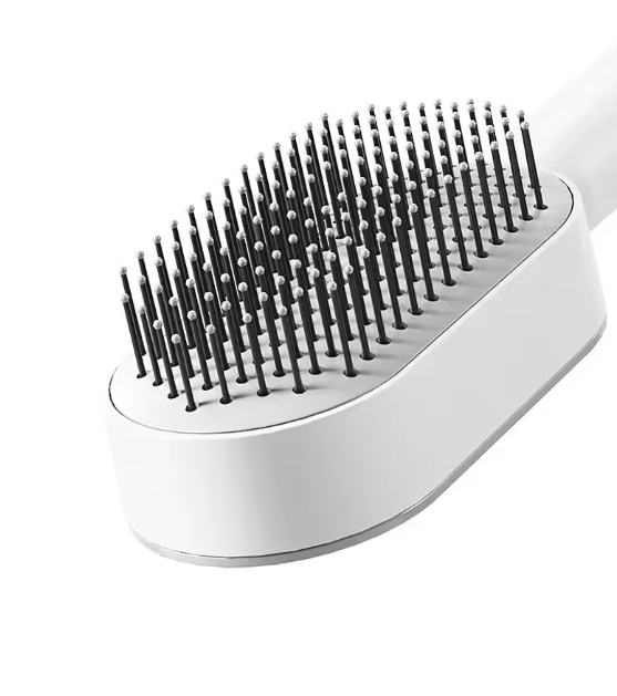 Brosse à cheveux autonettoyante