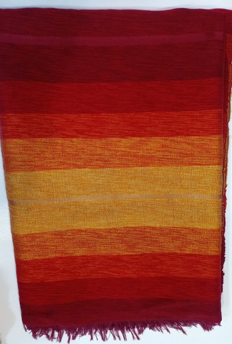 Couverture tissée en laine finitions pompons