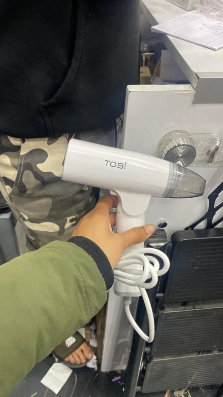 مكواة بخار يدوية للملابس