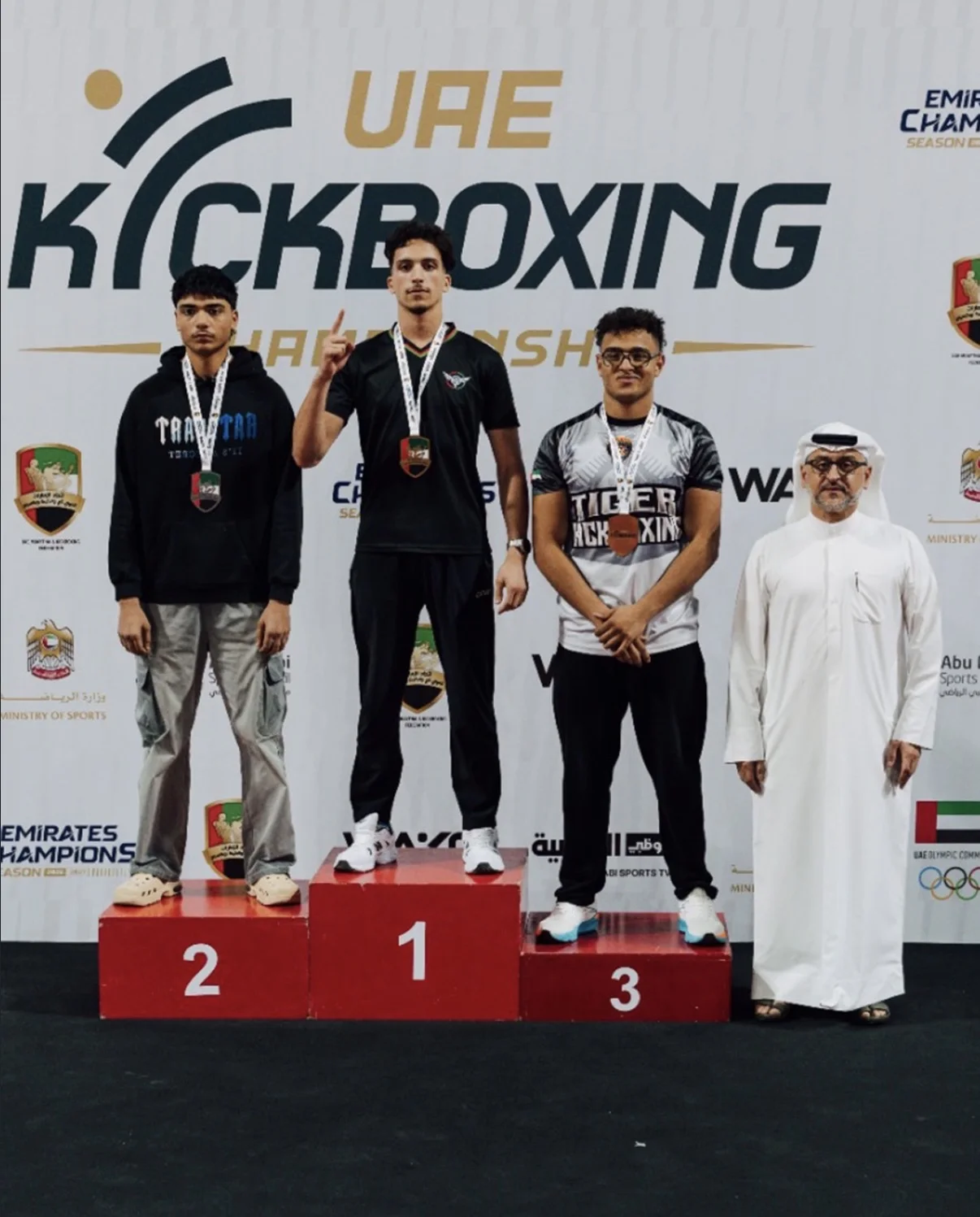 Coach Abdellah on the top step at the UAE Kickboxing Championship