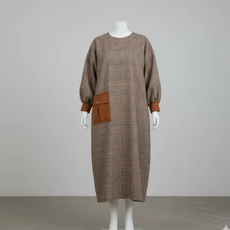 فستان كاروهات شتوي بلمسة عصرية وجيب أمامي مميز