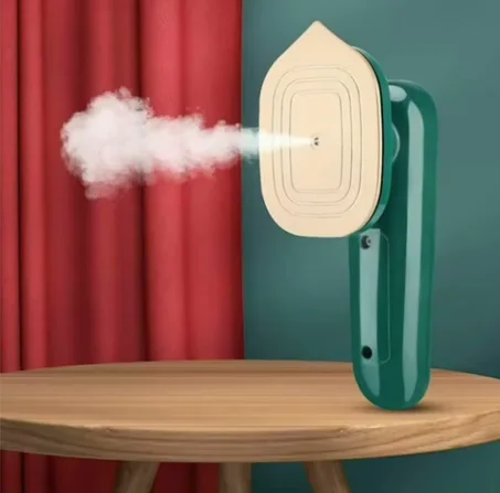 مكواة اليد البخارية