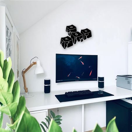 تصميم بارز لفن الحائط يجمع بين أزرار WASD