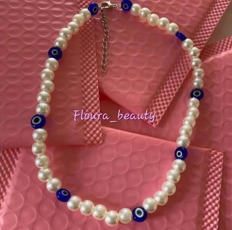Collier yeux bleu inoxydable