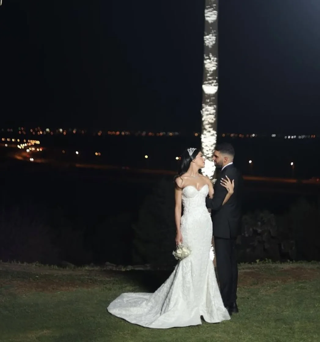 A strapless Lace Mermaid Gown