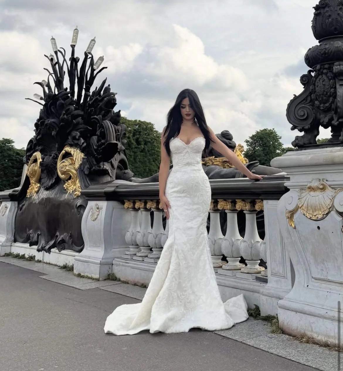 A strapless Lace Mermaid Gown