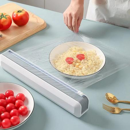 جهاز توزيع وقطع أغلفة الأغذية البلاستيكية