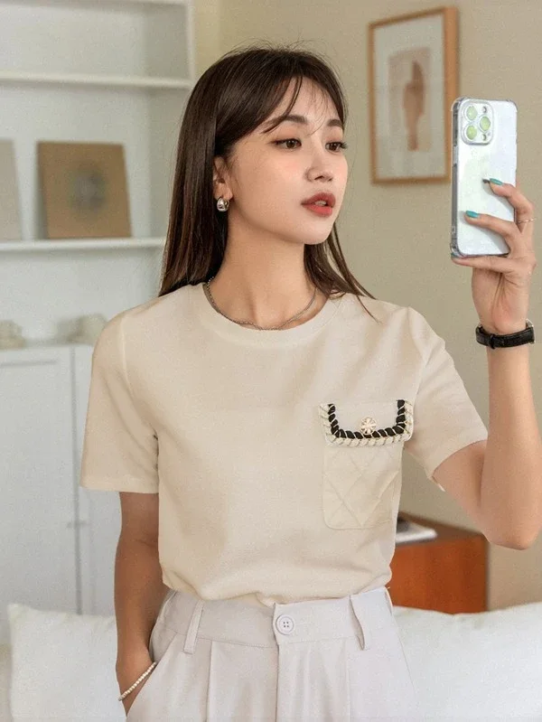 T-shirt avec poche à bouton