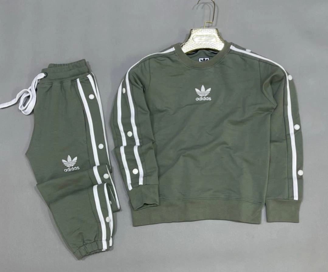 طقم رياضي (أنسومبل) بتصميم عصري وأزرار جانبية - جودة ممتازة