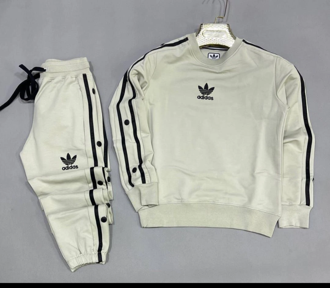 طقم رياضي (أنسومبل) بتصميم عصري وأزرار جانبية - جودة ممتازة