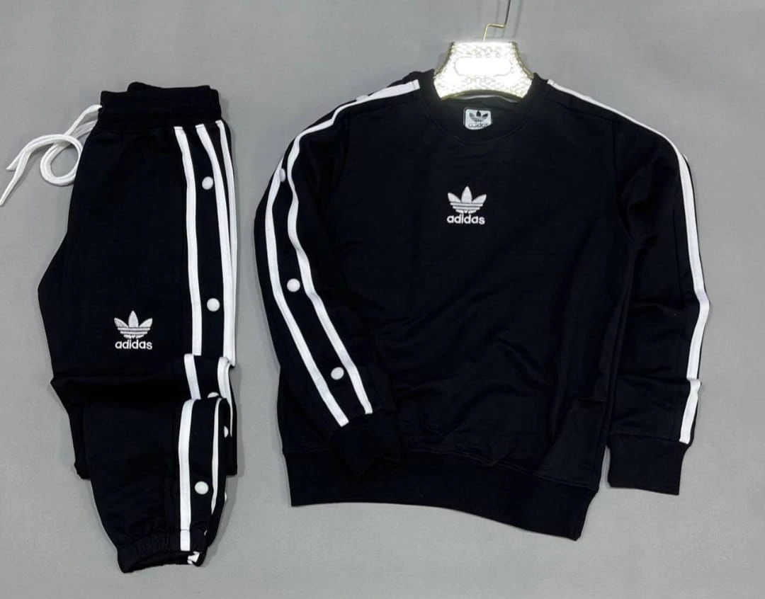 طقم رياضي (أنسومبل) بتصميم عصري وأزرار جانبية - جودة ممتازة