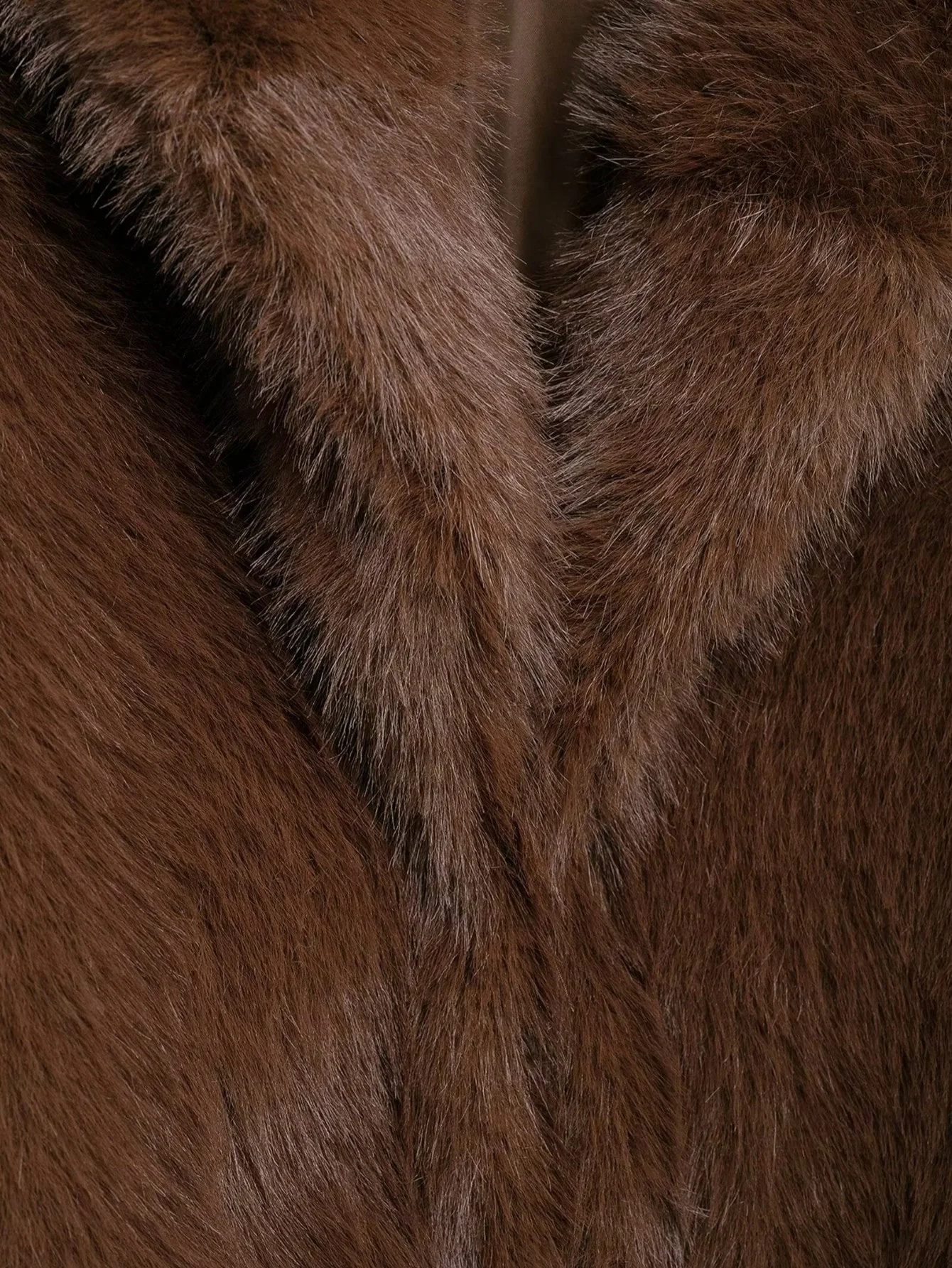 veste courte à col en fausse fourrure