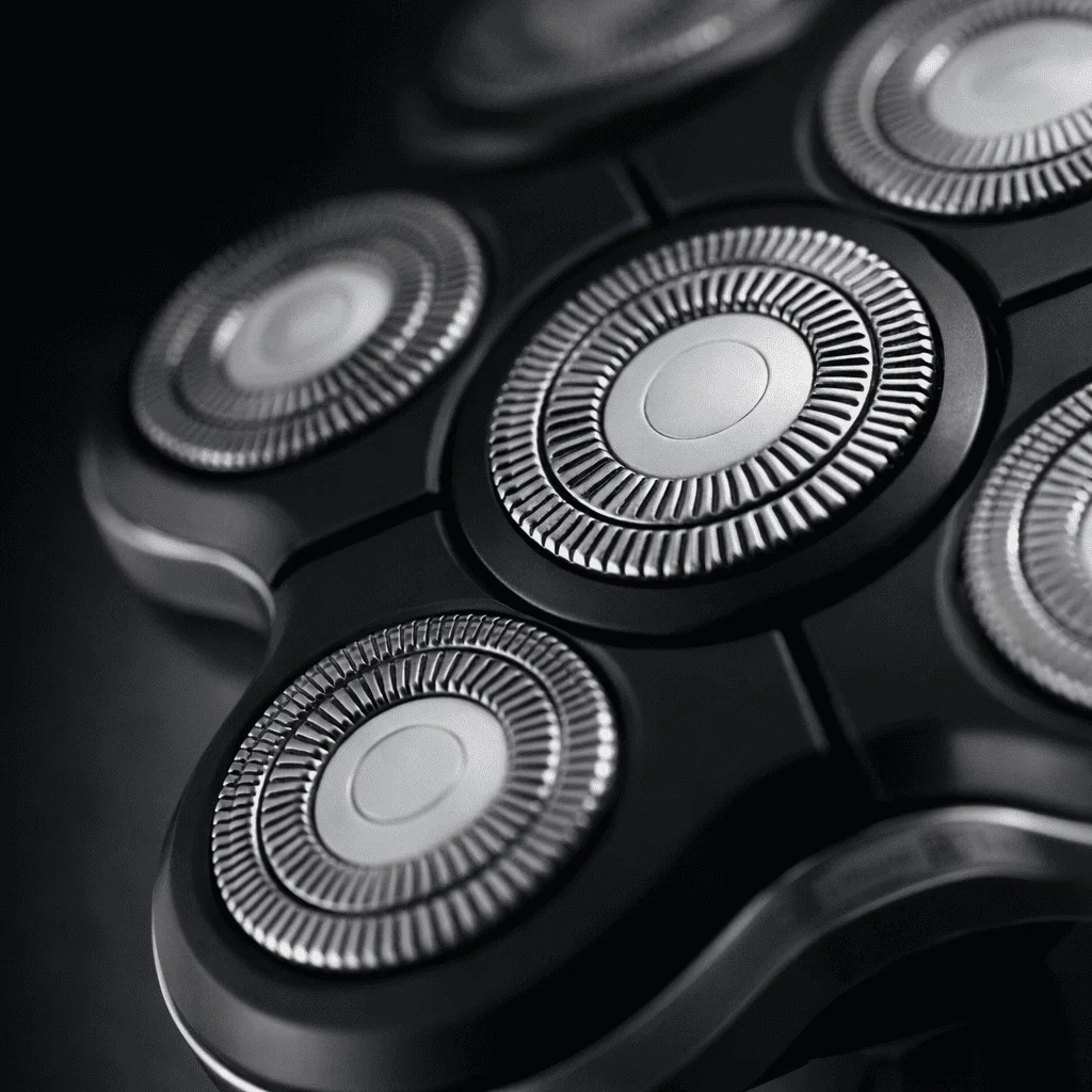 ماكينة الحلاقة الكهربائية Kemei KM-1111 للرجال، 5 في 1 للحلاقة والتشذيب وتنظيف الوجه. أداء احترافي، بطارية قوية، ومقاومة للماء."