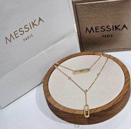Collier femme acier doré MESSIKA avec packaging messika