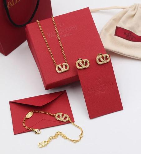 Ensemble femme acier doré,argenté collier + gourmet + boucles VALENTINO avec packaging Valentino