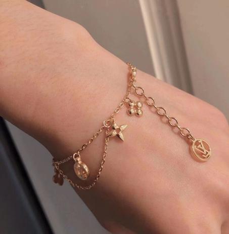 Gourmet femme acier doré Louis Vuitton avec packaging LV