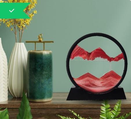 الساعة الرملية بفن الرمال