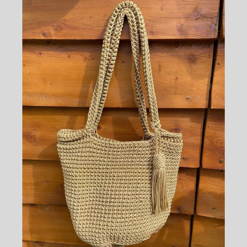 حقائب اليد المصممة يدويا