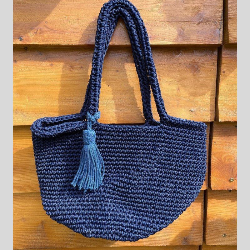 حقائب اليد المصممة يدويا