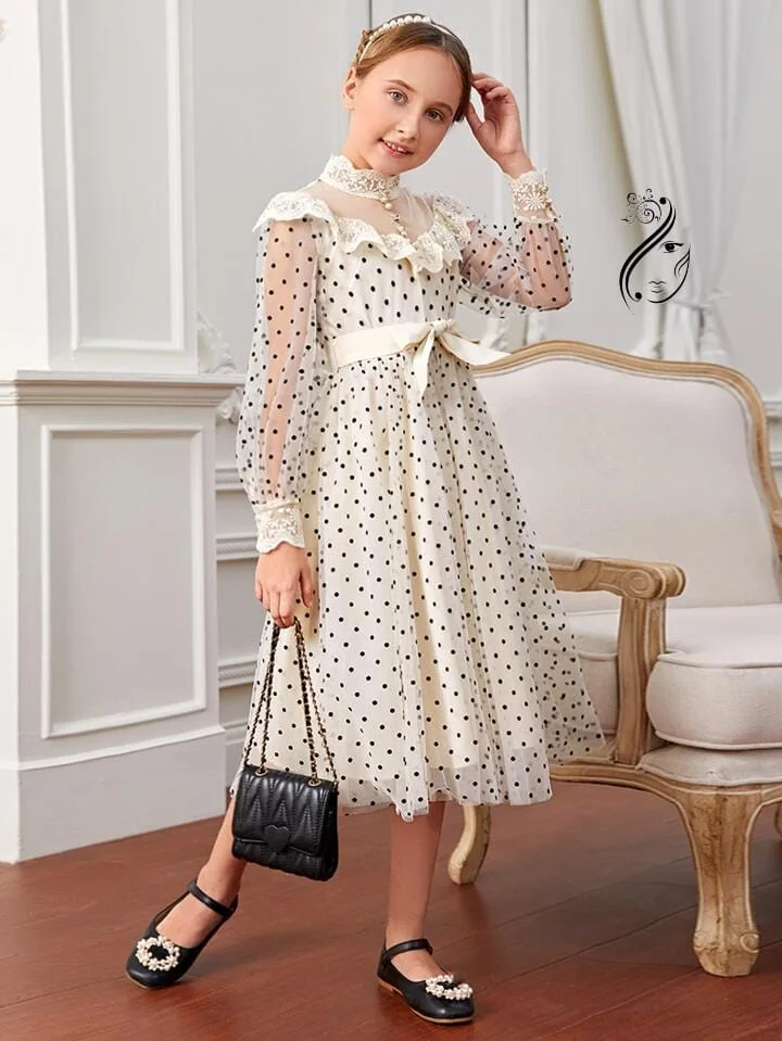 فستان بناتي تل منقط مع حزام بشكل خرافي المقاس من سن 8 سنوات الأ 12 سنة والسعر 25000  ريال يمني