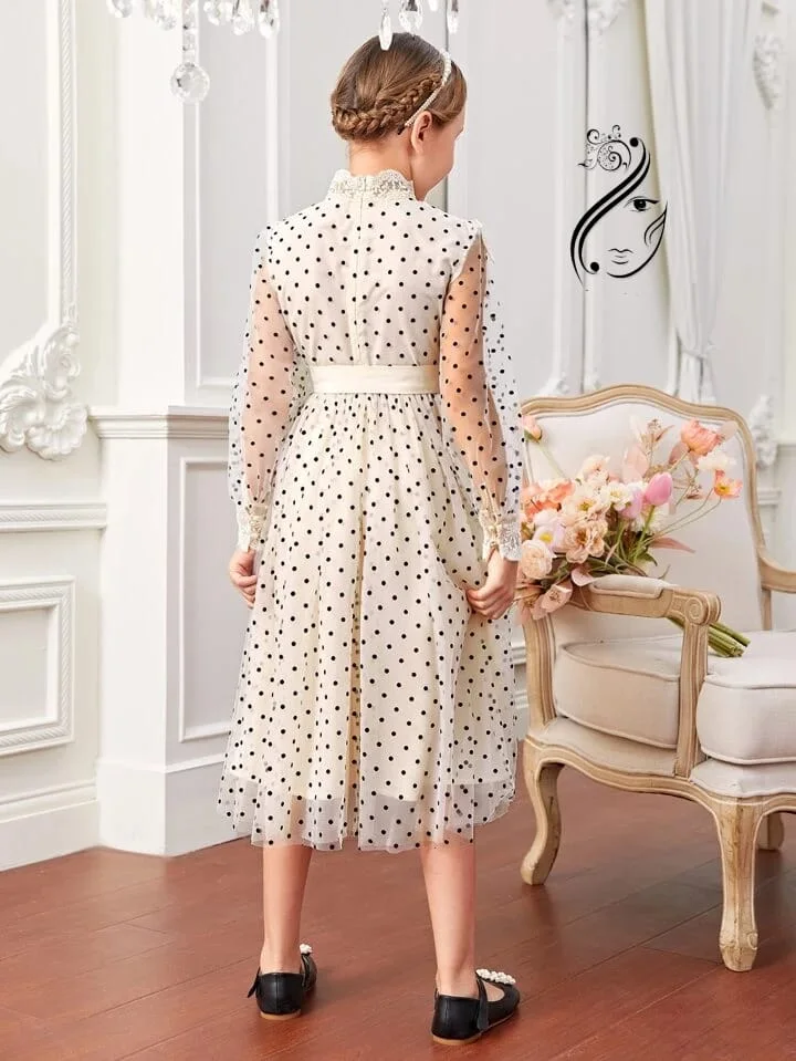 فستان بناتي تل منقط مع حزام بشكل خرافي المقاس من سن 8 سنوات الأ 12 سنة والسعر 25000  ريال يمني