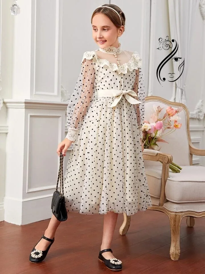 فستان بناتي تل منقط مع حزام بشكل خرافي المقاس من سن 8 سنوات الأ 12 سنة والسعر 25000  ريال يمني